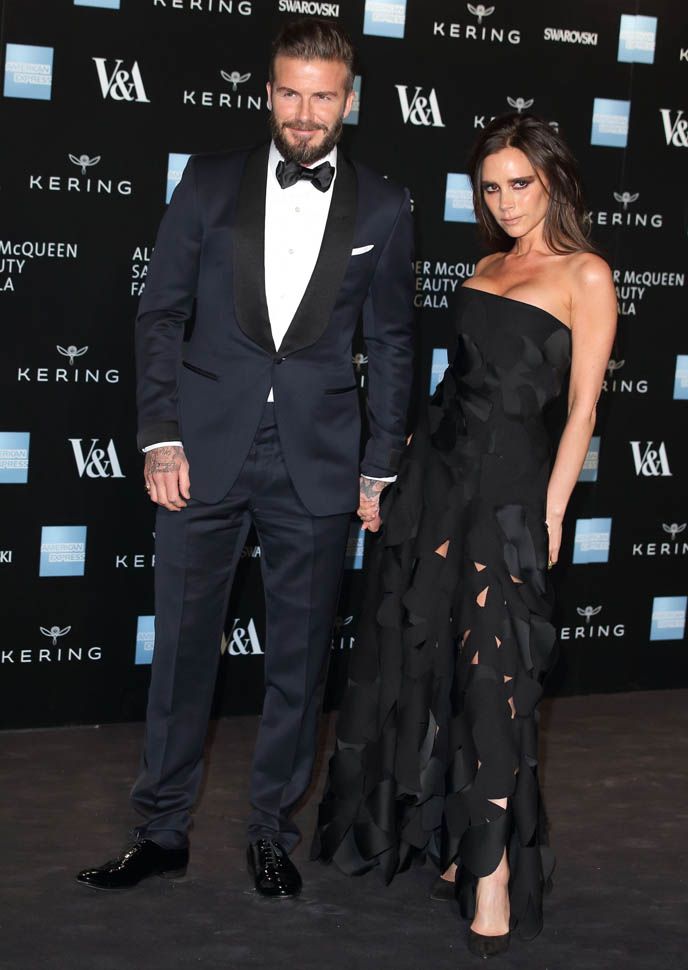 LONDON, ENGLAND - MARCH 12: Victoria Beckham and David Beckham attend a private view for the "Alexander McQueen: Savage Beauty" exhibition at Victoria & Albert Museum on March 12, 2015 in London, England. (Photo by Mike Marsland/WireImage)